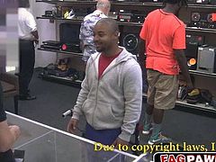 Black dude sell himself as a toy in a shop