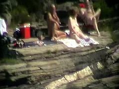 Wife having fun with strangers at beach. Public nudity