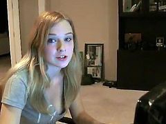Beautiful long-haired blonde Aurielee is having fun in her room. She sits at her computer and watches some solo sex videos.