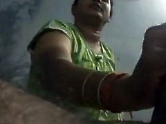 Filthy and old bitch with droopy tits and big ass oils the dick and starts to shake it. Have a look in steamy The Indian Porn sex clip.