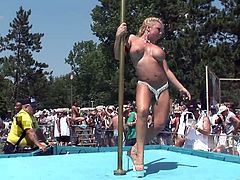 Check out this outdoor pole dancing contest with a bunch of fuckin' dirty-ass tramps doing their best to win. Check it out!