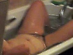 Big tits and belly float in the bath