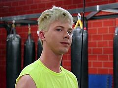 A cute twink was watching the training of a muscled hunk when he got a boner. The hunk decided to punish this young dude an totally destroyed his tight asshole.