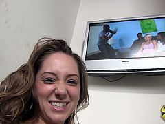 Pretty brown-haired girl Remy LaCroix is having fun in her room in behind-the-scenes clip. She watches her interracial sex video and comments on it.