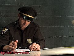 Check out that nasty police officer having fun with a prisoner. He wants to fuck his ass, but first wants to humiliate him and play with his cock!