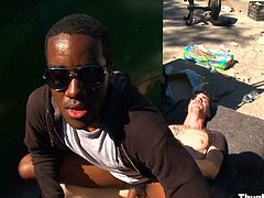Black guy is fucked outdoors by a thick cock