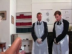 Filthy porn scene featuring seductive blonde MILF is presented by Lust Cinema. Three man wearing suits play with her shaved pussy and tight anus using smooth sex toys.
