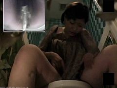Check out this horny asian slut masturbating her hairy pussy in the toilet. What she doesn't know is that she is being recorded by the spy cam!