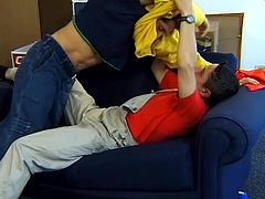 Two gays kiss sitting on the sofa. Then they take off clothes and give a blowjob to one another. One of these guys gets rammed in the ass and facialed.