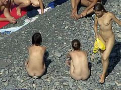 It's amazing to see such hot beauties with their nude forms exposed, enjoying the beach