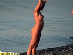 Beach Hunters brings you a hell of a free porn video where you can see how this naughty amateur spycam gets some horny naked couples having a good time in the beach.