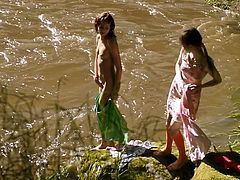 The teen lesbians are slowly undressing but ended up licking each other's pussies instead of swimming. Watch their intense amateur and outdoor sex!