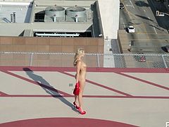 She's standing on the helipad wearing nothing but a pair of red heels. All the men will want to land their helicopters and see her. She heads into her penthouse with her man and kisses him and climbs on top of him to fuck.