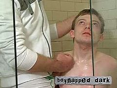 If you like young boys just tak a look at this sexy twink and his older buddy. He ties him up in the bathroom and starts playing with his asshole and cock.