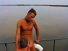 Watch these two gay hunks fucking on a boat outdoors where everyone might be able to see them having fun.