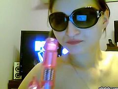 Exciting amateur clip featuring frisky teen gal. She is wearing nothing but sun glasses. Kinky girl takes teasing position while having steamy webcam session.