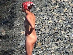It's amazing what great views does horny voyeur has while spying on nude girls at the beach
