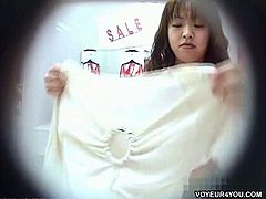 These Asian women try on a few types of sexy lingerie. They have no idea there is a camera in the dressing room and behave like they are all alone in there.