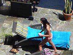 two hot girls topless by the pool in waikiki