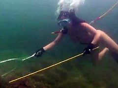 Hot girl and a guy dive and have sex on the sea bed. The girl gives a blowjob and then gets fucked from behind. It seems that this couple have great underwater sex experience.