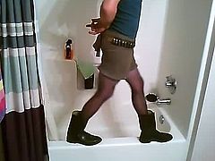 Sissy guy dressed like a slutty cowboy stripping