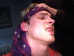 Take a look at this gay scene where this blindfolded guy sucks on a big cock before being fucked silly and covered by semen.