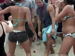 These gorgeous babes get a little horny in the beach party and flash their perfect round asses and their bouncy boobs for the guys.