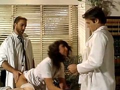 Two horny guys attack one sweet looking babe wearing nurse uniform. They drill her pussy and gougers ass right on the table in the hospital.