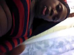 Ebony TG stroking huge cock in bathroom