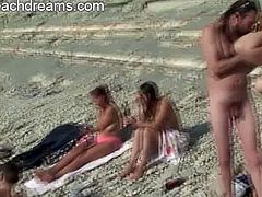 Make sure you check out these horny nudists friends having fun at the beach. They are all naked and want to have some fun. They don't know that someone is recording everything.