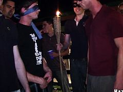 This sexy frat house pledges are blindfolded and forced to suck on some huge hard cocks during their nasty hazing ritual.