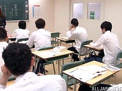 Get excited by watching this Asian teacher, with a nice ass wearing a miniskirt, while she uses her mouth in a special way after a class.