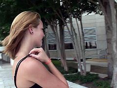 Slutty chick flashes her tiny tits and butt outdoors