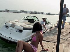 Have fun with this great hardcore scene where the sexy brunette Tiffany Merlot is fucked by a guy on a boat in the middle of a lake.