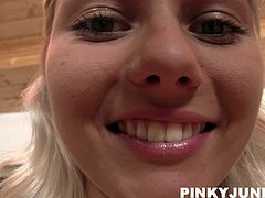 Blonde teen hottie Pinky June looks at the camera seductively, while wearing her fancy sunglasses. Her eyes are inviting you to fuck her. She sits on the couch and flashes her ass. She looks super cute in her Daisy Dukes. Pinky pulls those jeans shorts aside, to play with her wet cunt.