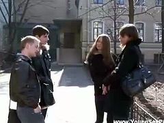 These two teens meet two guys and go at their place. That's where they get drunk and fuck in group. The guys fuck them in the same positions simultaneously.
