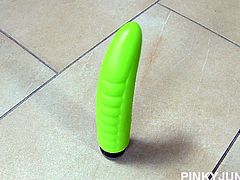Sexy blonde bitch Pinky June sits down on the floor with her favorite green dildo. She spreads her legs to get ready to insert the sex toy into her vagina. She teases herself, but she waits until later to shove the toy in her pussy. Pinky takes out some lube and gets her vagina even wetter for easy insertion.