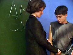 Teacher puts her hand into a young boys pants WF