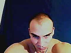 Muscular guy in red brief possing in front of his webcam to show his muscular while massaging his cock. He put down his brief and started masturbate his huge dick.