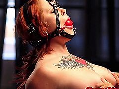 Redhead ginger sub tits manhandled with wooden pegs