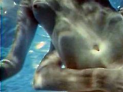 Lusty blonde girl is having passionate sex while bathing in a pool