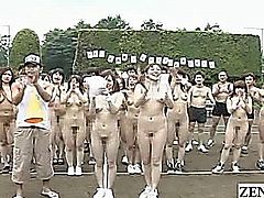 Over a dozen Japanese AV stars gambol outside in a group CMNF nudist sporting event that starts with synchronized stretching that combines standard positions with ones of a lewd nature such as butt cheek spreading before gathering together and anxiously awaiting the start of the games with subtitles