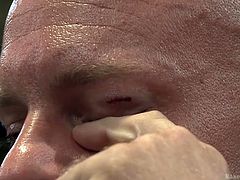 They are big, muscled and tensed. These men should use a hard fuck instead of such a hard fight but they will get one for sure. After giving their best it's clear which one is superior so the bald guy kneels in front of his conqueror and sucks his cock like a submissive slut. He loves it!