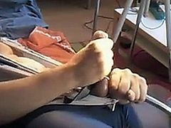 This guy loves to stick things into his stiff clamped cock