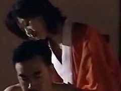 Tied and Suspended Asian teen gets spanked and whipped