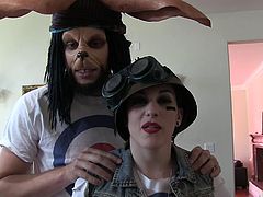 These fuck buddies are dressed up in some weird costumes and getting ready, to film a nasty sex scene. The guy is wearing a weird looking creature mask and big ears, while the cute girl is wearing a sexy army uniform and camo. They run around in the yard and rub against each other in the living room.