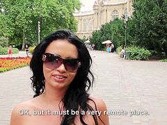 I was walking down the street in Bucharest, when I spotted this sexy looking whore. She looked hot in her flower print dress and shade. Her long black hair made her so enticing to me. After chatting her up, she took me to the park, where she sucked my cock in a wooded area.