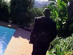 This babe is in her backyard, toying her butt hole. A black man shows up and catches her. She grabs his massive dick and sucks on it nicely. He can't refuse her.