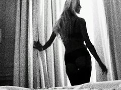 Beautiful blonde doll Tia came over to my place, wearing really sexy black lingerie. She rubbed her cunt and showed me her big boobs, before opening her legs, so I could eat her pussy out. She moans and squirms, as I give her cunnilingus.