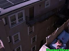 Amazing aerial shot from a flying camera as it films these horny couple who are naked and caught fucking in the balcony. Watch the action in an awesome aerial style shots.